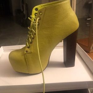 Green booties... brand new..